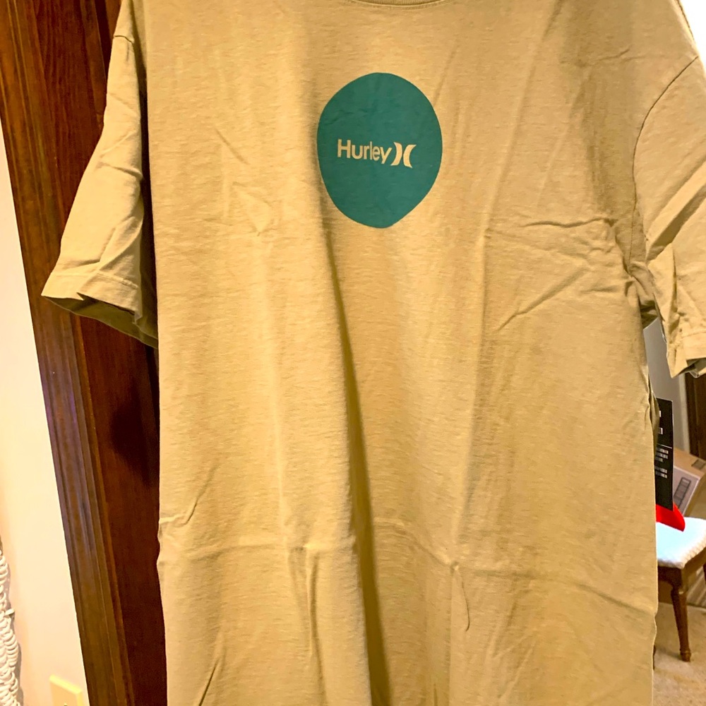 For sale, extra large Hurley T-shirt logo on front new with tags.